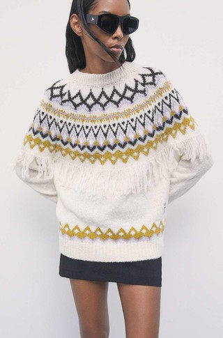 Fringed sweater with pattern