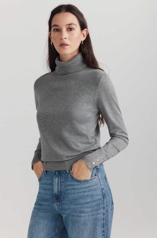 Turtleneck knit jumper with decorative buttons