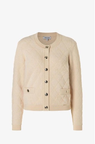 Pletena jopa z dekorativnimi gumbi