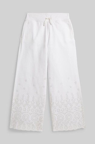 Široka bombažna trenirka z luknjičastimi vezeninami