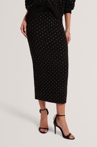 Pleteno oprijeto krilo z okrasnimi kamenčki