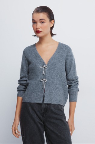 Cardigan with decorative bows