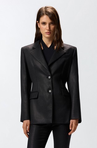 Suknjič s kovinsko svetlečimi vlakni in paščkom zadaj