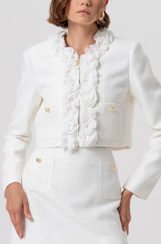 Kratek suknjič iz tvida s cvetličnimi aplikacijami