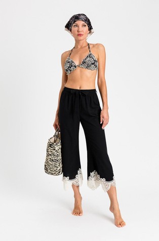 Cropped muslin trousers with macramé