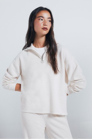 Knitted jumper with half-zip