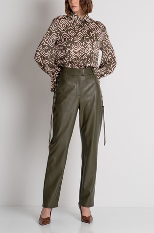 Pant made in fake leather with eyelets