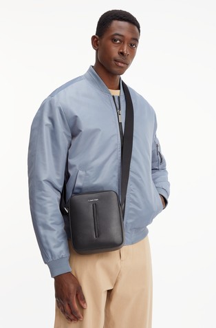 CALVIN KLEIN Recycled Faux Leather Crossbody Bag | Emporium CALVIN KLEIN Recycled Faux Leather Crossbody Bag | Emporium