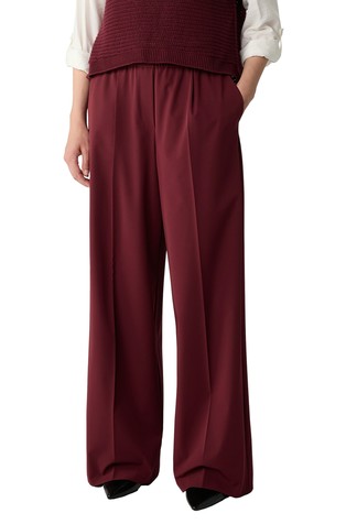 Hlače z elastičnim pasom in širokimi hlačnicami