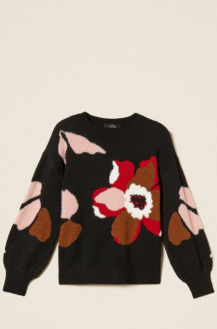 Jumper with inlaid flower