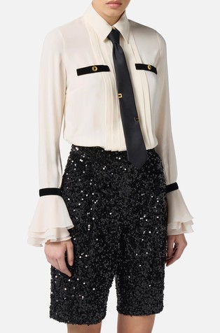 Kratek kombinezon s kravato in bleščicami