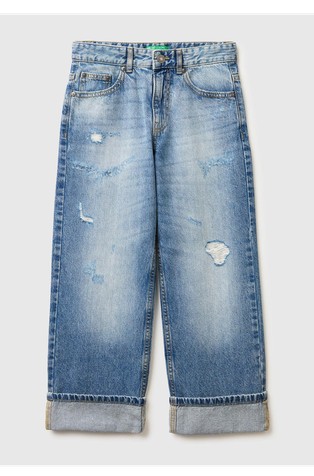 Straight jeans with rips and turn-up