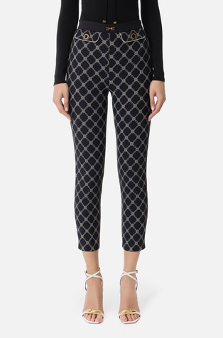 Trousers in crêpe fabric with diamond print