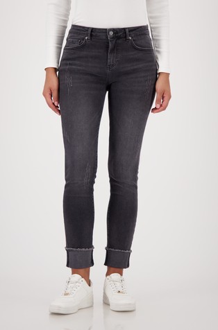 Jeans hlače z raztrganinami in okrasnimi kamenčki