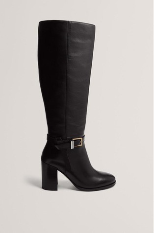 Usnjeni škornji s peto