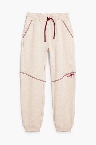 Elastic waistband trousers with seams