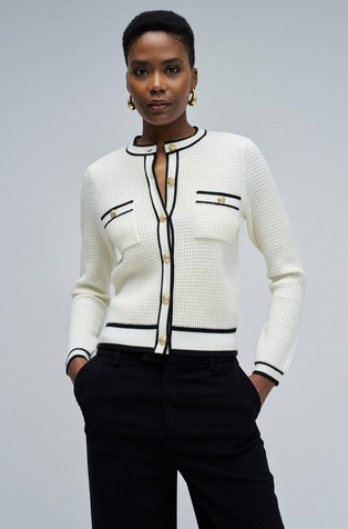 Pletena jopa z zlato obarvanimi gumbi