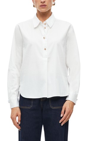 Shirt with decorative button details