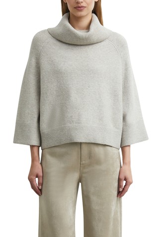 Poncho-style sweater with a wide turtleneck collar
