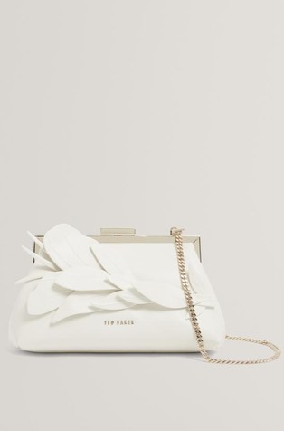 Pisemska torbica z reliefno cvetlično aplikacijo