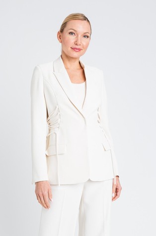 Suknjič iz krep tkanine s stranskimi trakci