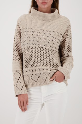 Luknjičasto pleten pulover z bleščicami