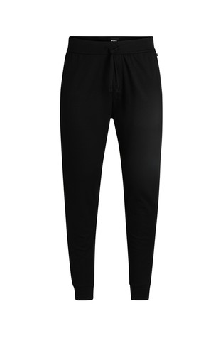 Tracksuit bottoms in cotton terry with logo print
