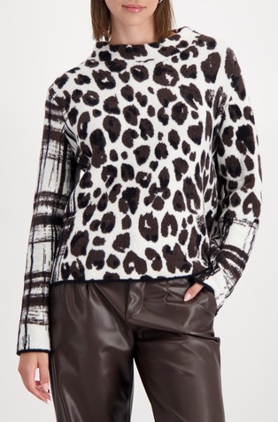 Kosmaten pleten pulover z različnimi vzorci