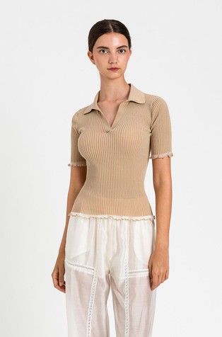 Knit short-sleeved polo with wavy trims