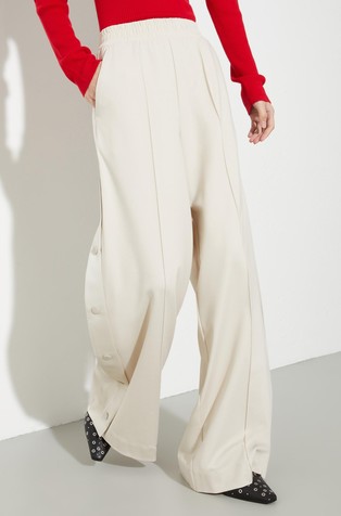 Široke jersey hlače s satenastim trakom na straneh