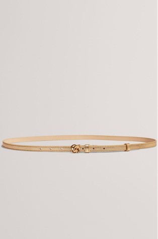 Pas iz kovinsko svetlečega usnja