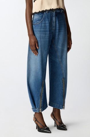 Balonaste jeans hlače z zadrgo na hlačnicah