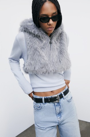 Brezrokavnik iz umetnega krzna s kapuco