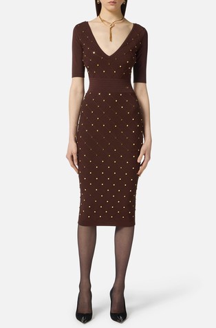 Pletena obleka z dekorativnimi neti