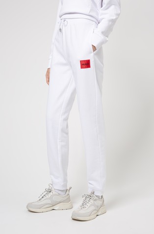 HUGO - Cotton-terry tracksuit bottoms with logo label