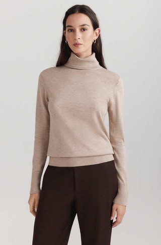 Turtleneck knit jumper with decorative buttons