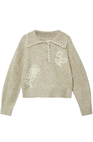 Pleten pulover s polo ovratnikom in vezeninami