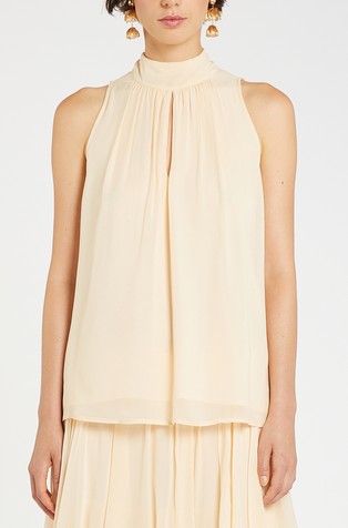 Sleeveless blouse with back bow