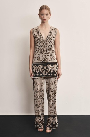 Pants with jacquard arabesques and lurex details