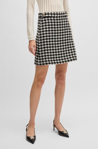 Houndstooth mini skirt with decorative buttons
