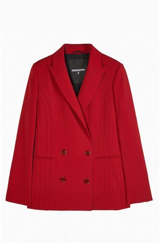 Suknjič z dvorednim zapenjanjem