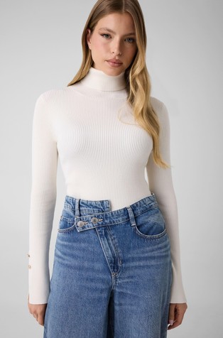 Ribbed turtleneck with buttons on sleeves