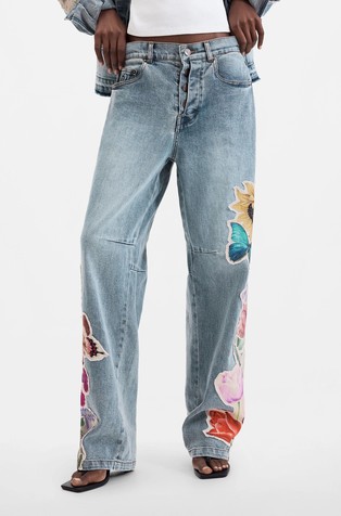 Ravne jeans hlače s cvetličnimi našitki