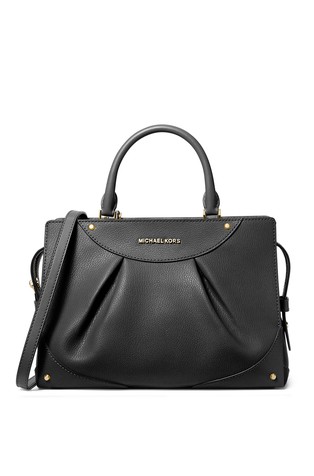Michael kors shoe size sales comparison