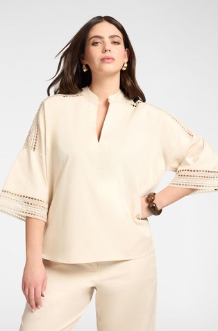 Kimono-style blouse with macramé trims