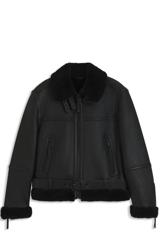 Leather jacket with shearling trims