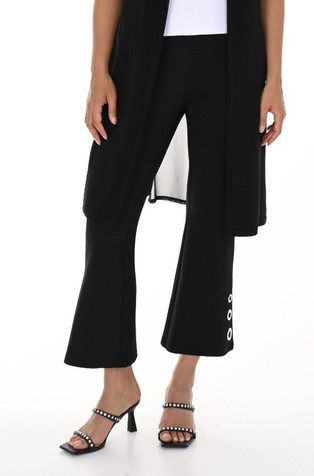 Flared trousers with metall eyelets