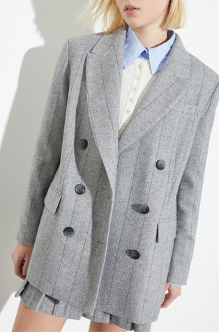 Flanelast suknjič z dvorednim zapenjanjem