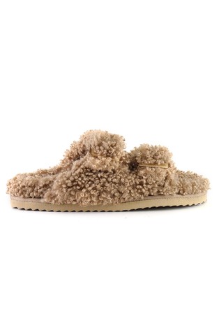 Slippers in faux teddy fur with colored buckles