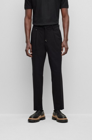 Relaxed-fit trousers in stretch material with pleat front